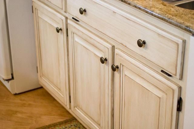 Faux painting and finishing of kitchen cabinets