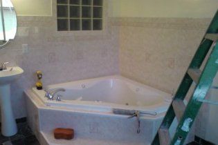 jetted corner tub and tile install