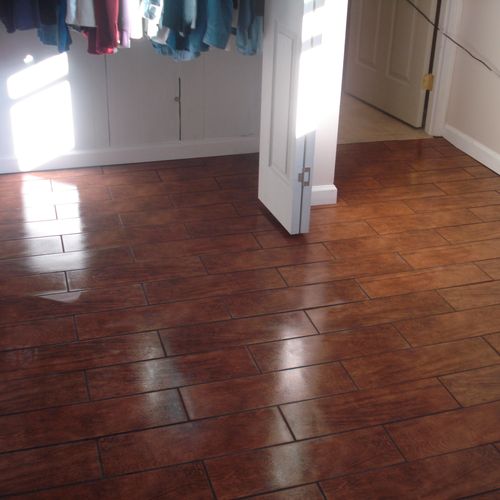 This is a 19x6 inch woodgrain tile set in staggere