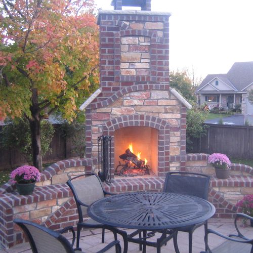 Custom built Minneapolis outdoor fireplace. Call 6