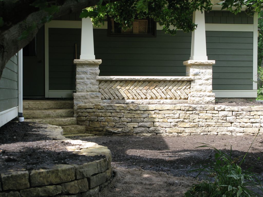Mortared Limestone Columns With Dry-Laid Stone Wal