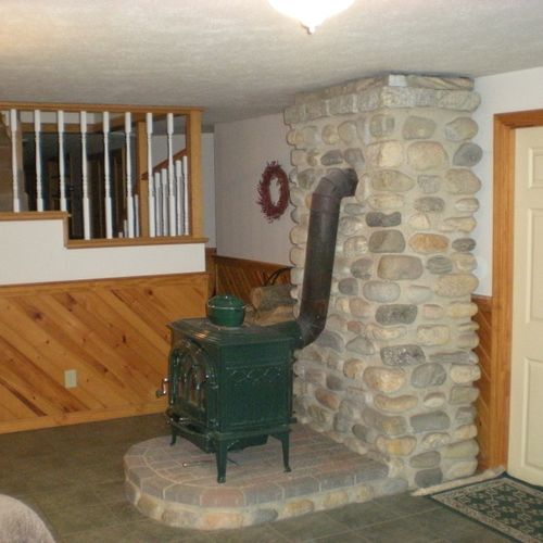 Installtion of wood stove and hearth, with chimney