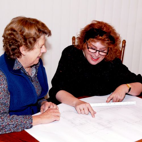 With client, Nancy Lindberg, developing scale plan