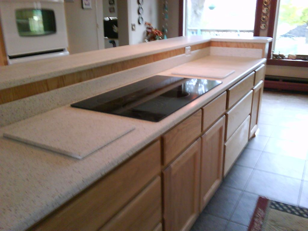 Solid surface island with cook top Center City Mn.