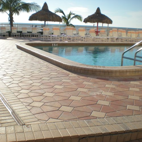 Beach hotel pool deck cleaned and sealed in Madier