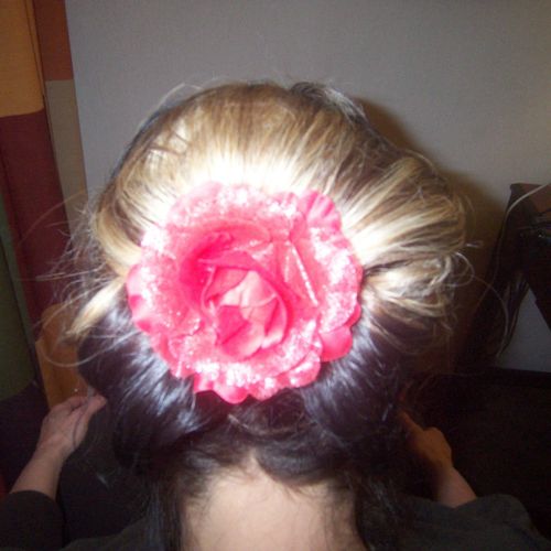 Pin up hair with flower accessory