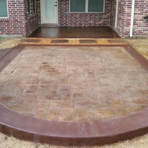stamped concrete patio with acid stain color