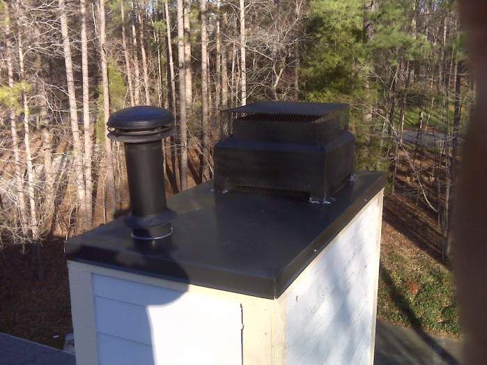 Chase top of chimney after replacement and repaint