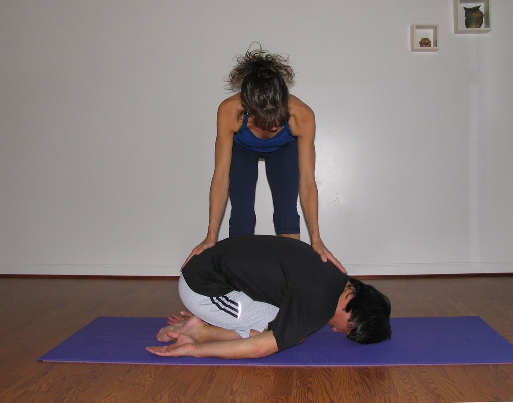 Child's Pose, or Balasana, is a restorative pose p