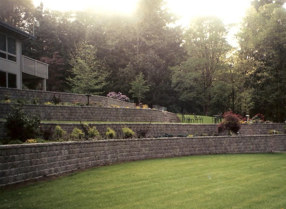 This yard needed some retaining walls to create th