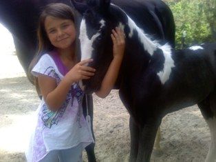Kaylee reimel with her new baby Nieko
