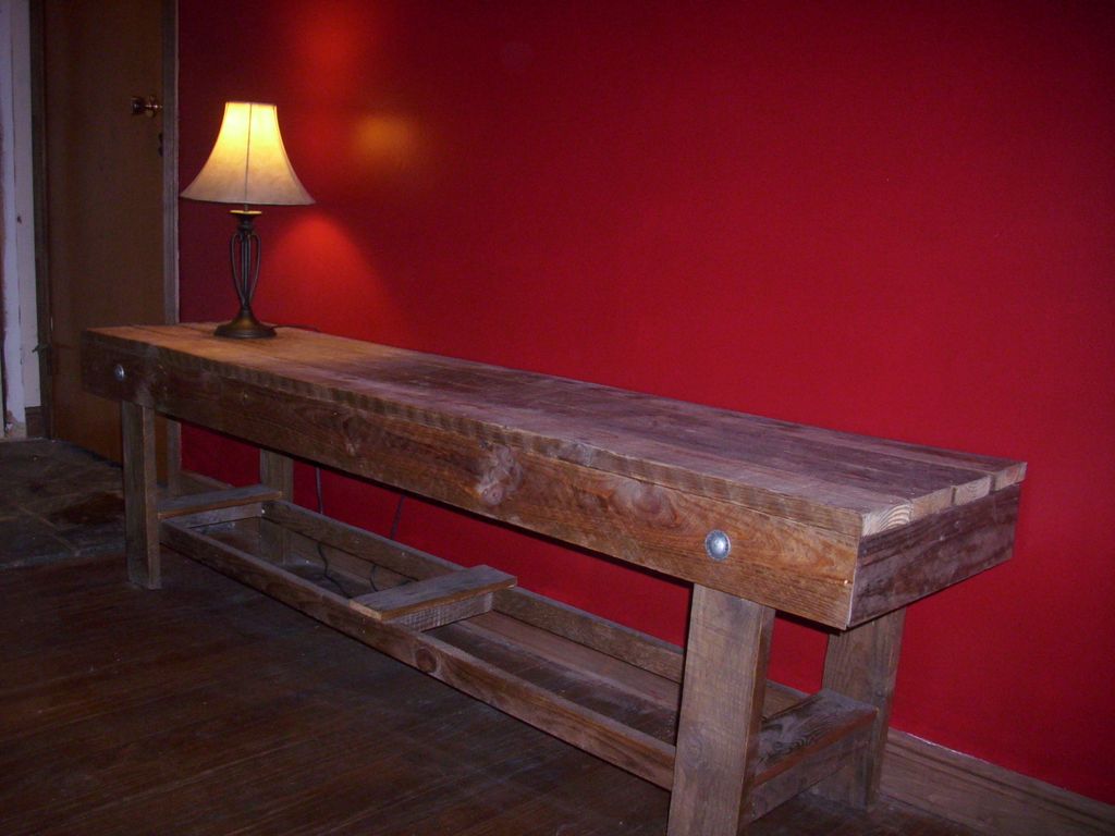 Table made from reclaimed wood, available in end t