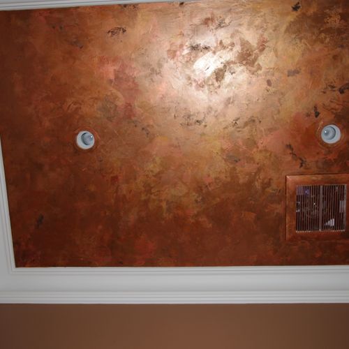 Metallic copper effect on ceiling in powder room
