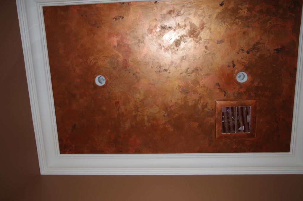 Metallic copper effect on ceiling in powder room