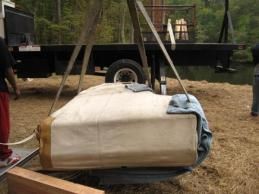 preparing piano to be craned up to second floor