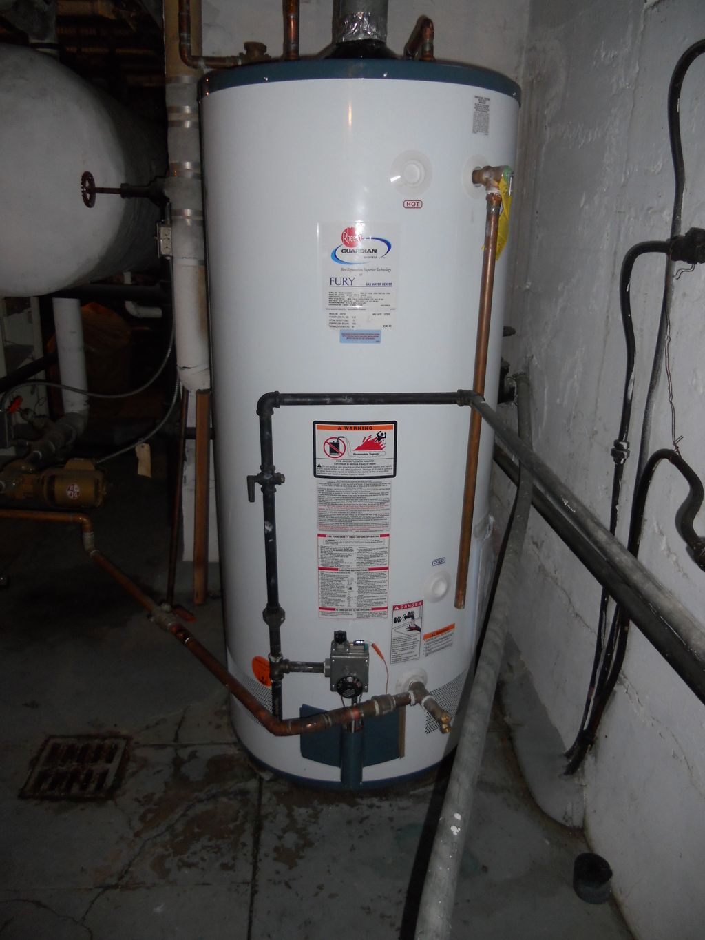 New 75 gallon Rheem gas hot water heater.