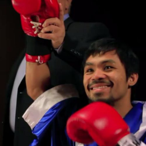 Manny Wearing Pro Boxing gloves