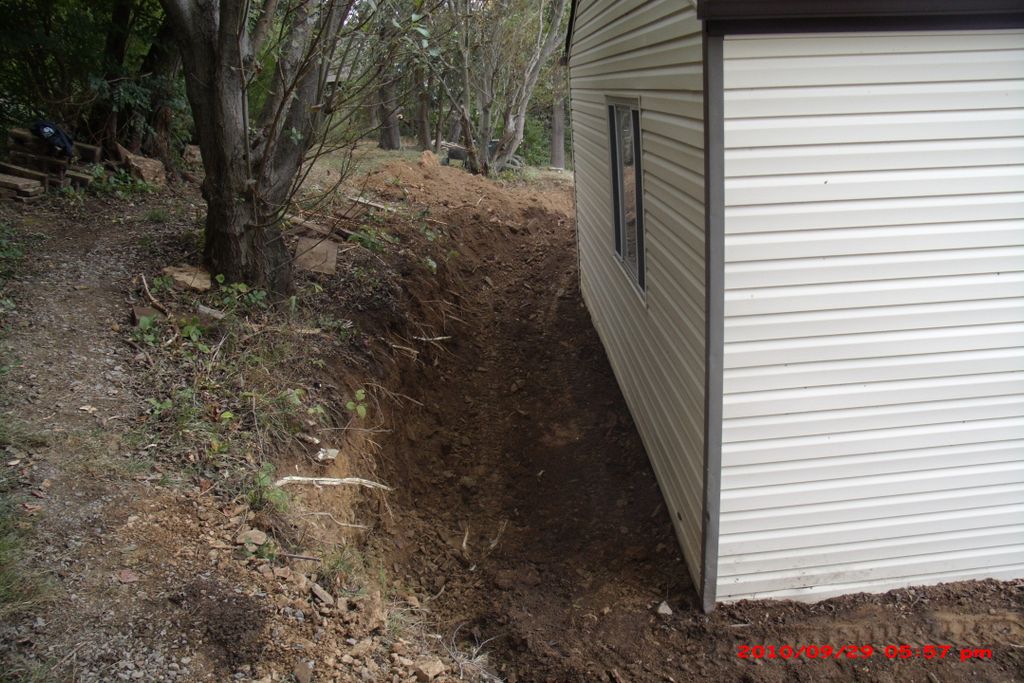 Retaining wall construction and excavation before