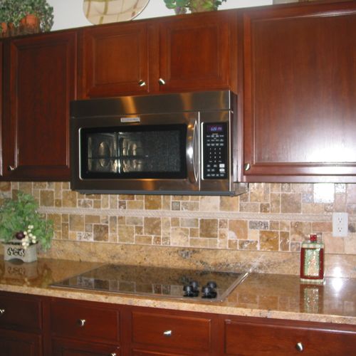 Removed prior white tile backsplash and replaced w