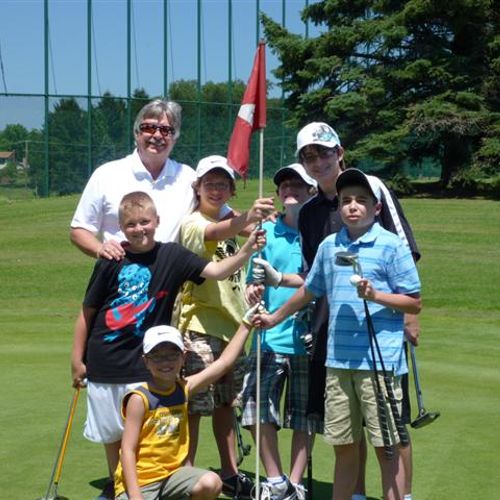 Ron with junior golfers