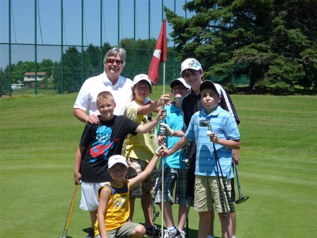 Ron with junior golfers