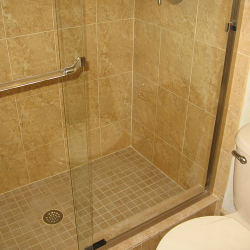 Removed tub and installed a new walk in shower wit