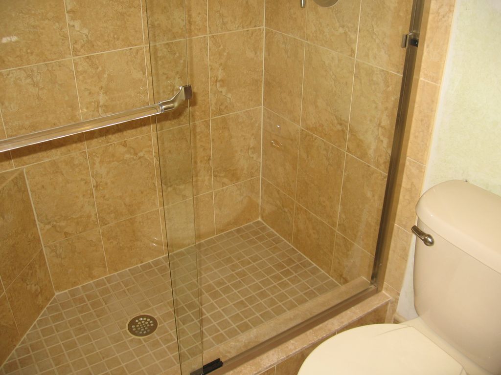 Removed tub and installed a new walk in shower wit