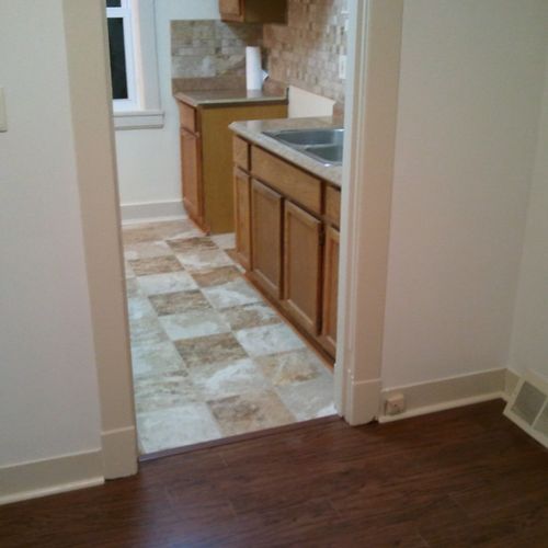 Tile kitchen and laminate flooring. ALLOC beveled 
