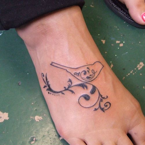 foot tattoo bird design