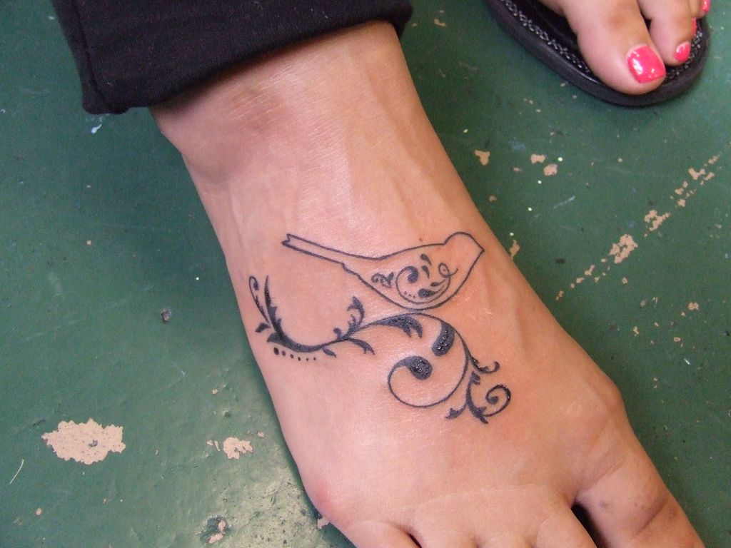 foot tattoo bird design