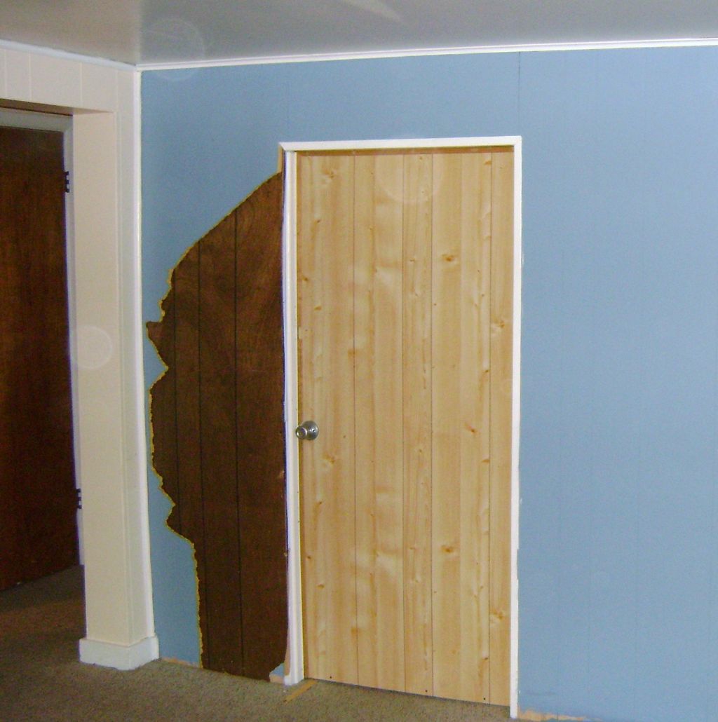 Raise height of door frame, replace door, repaint 