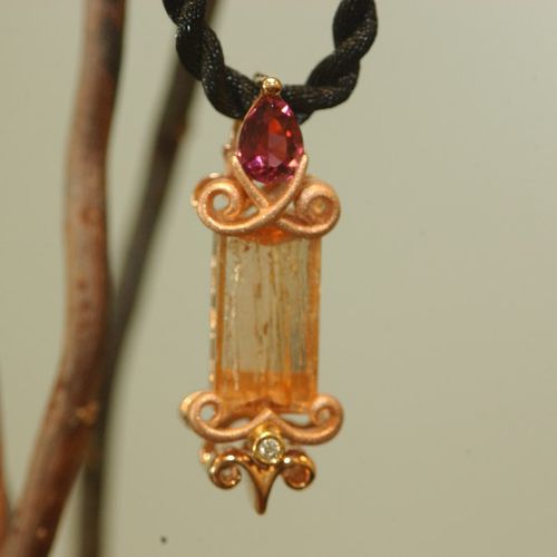 Imperial Topaz pendant with diamonds and pink tour