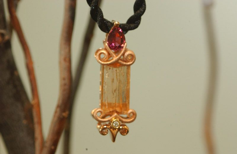 Imperial Topaz pendant with diamonds and pink tour