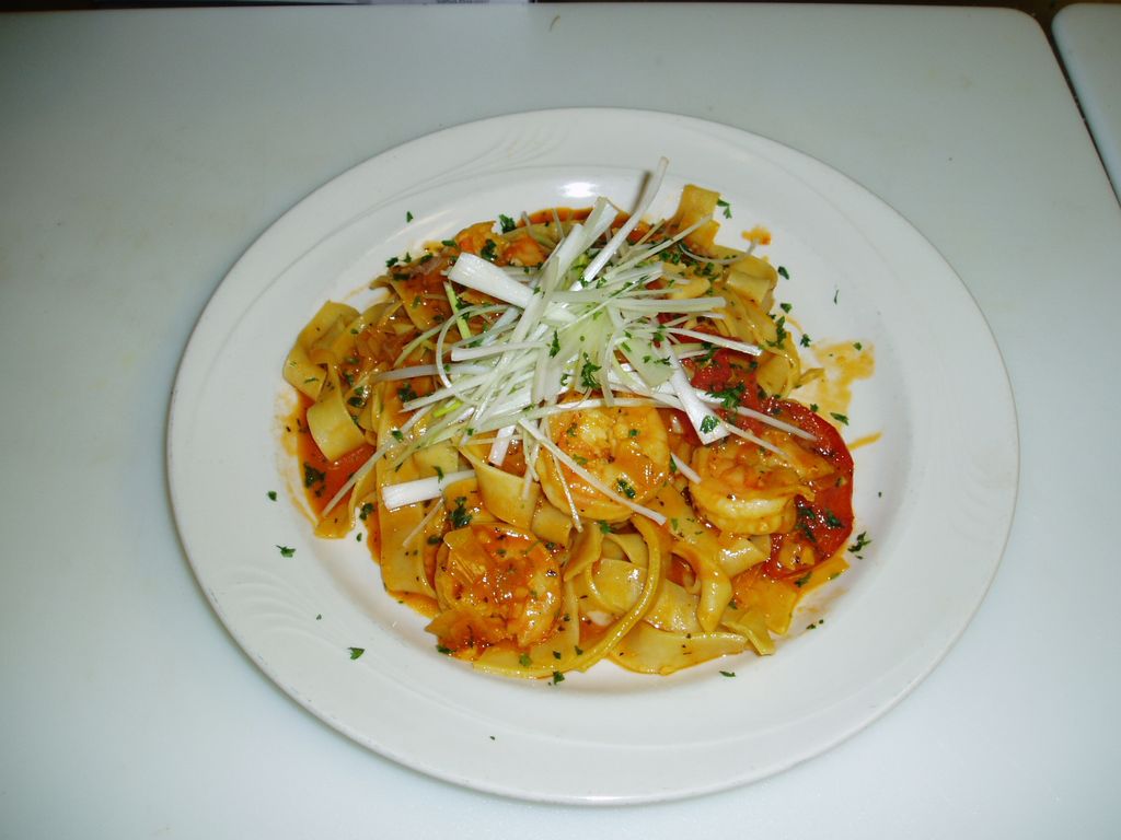 Parpadelle Pasta with shrimp in a safron tomato le