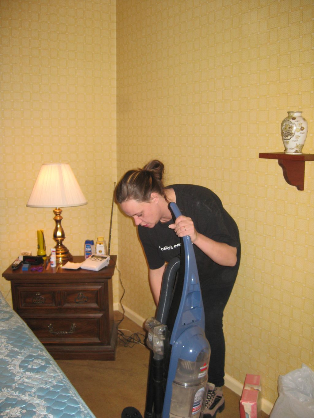 Tabitha cleaning for the McChesney guys' aunt whil