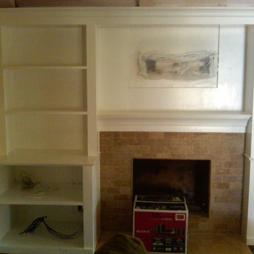 Custom Built-In cabinet and fire place. Done in 4 