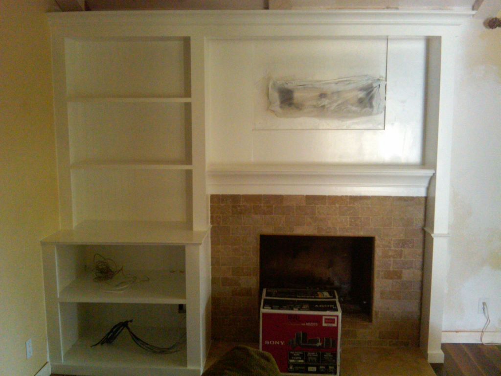 Custom Built-In cabinet and fire place. Done in 4 