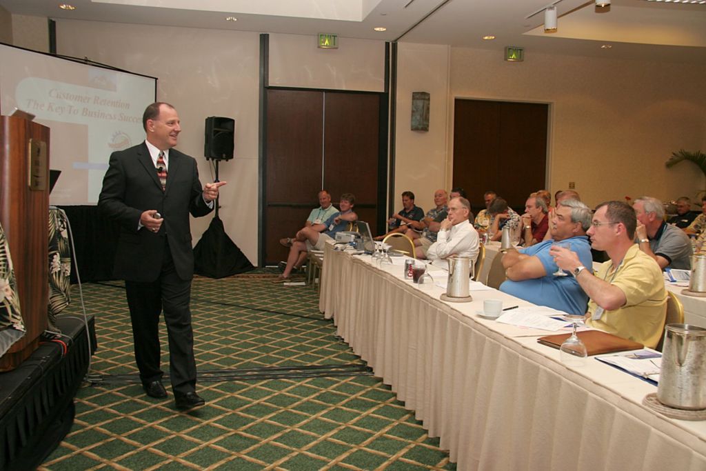 Russ Lombardo, providing sales training to a group