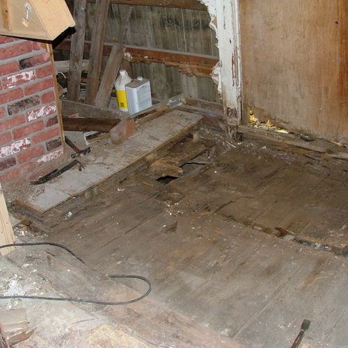 Water damage under portion of kitchen floor - floo