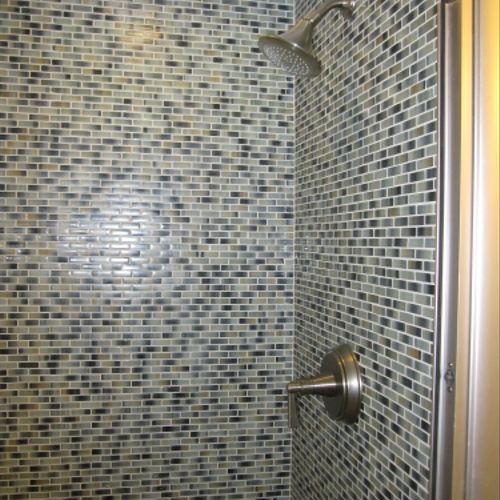 Tile shower surround.