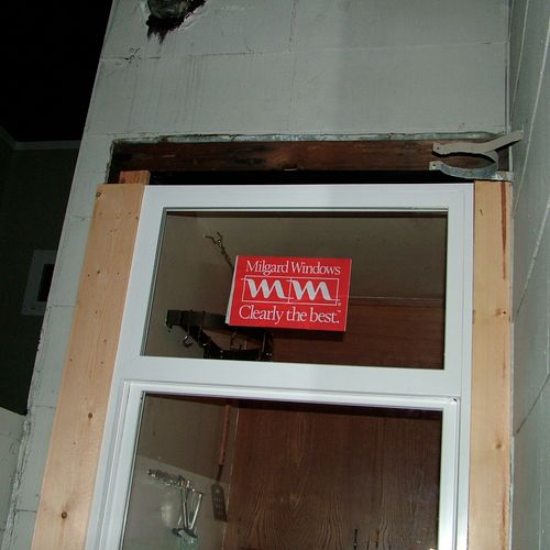 Dry rot replacment of window and re framing of rot