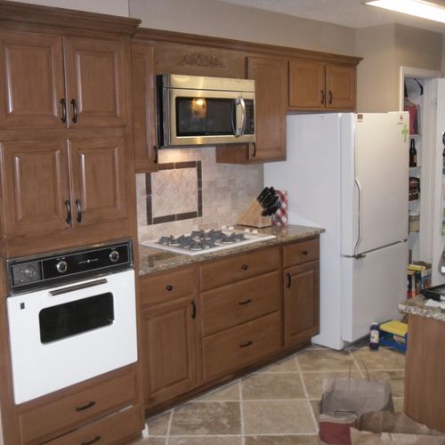 Beautiful cabinets transformation with awesome bac