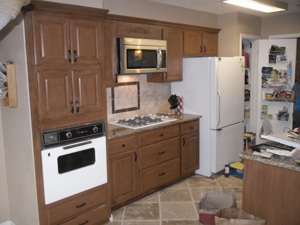 Beautiful cabinets transformation with awesome bac