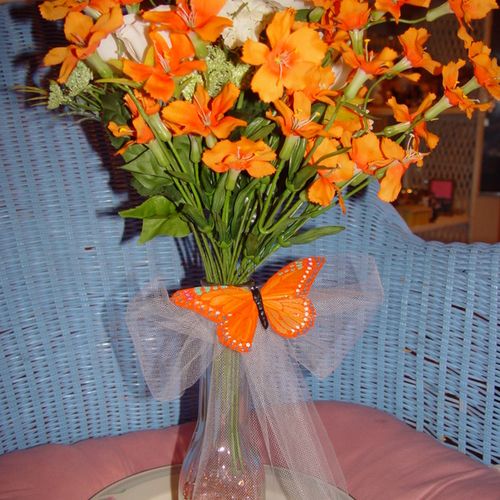This bright orange silk flower arrangement is one 
