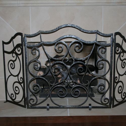 Hand forged fireplace screen for a gas log firepla
