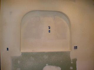 Arched Niche in kitchen above stove.