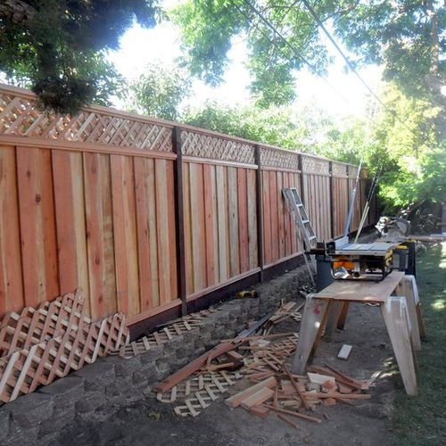 working on the fence/ retaining wall