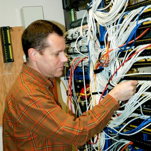 Geoff working at a customer site