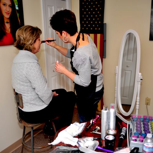 Myself getting client ready for photo shoot