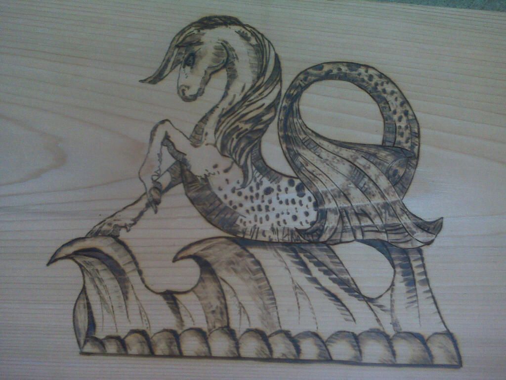 Seahorse wood burning detail, as requested by tree